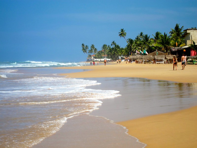 Hikkaduwa Beach boasts a remarkable natural beauty that captivates visitors. The shoreline stretches for several kilometers, adorned with soft golden sands and swaying palm trees.