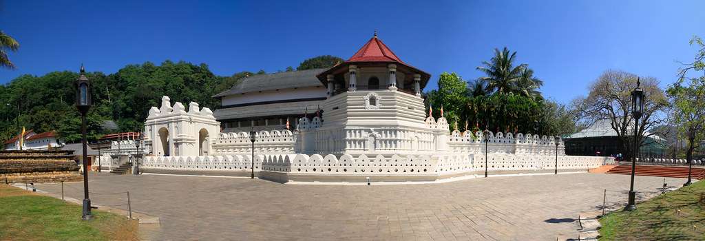 The Temple of the Sacred Tooth Relic, also known as Sri Dalada Maligawa, is a significant religious and cultural site located in the city of Kandy, Sri Lanka